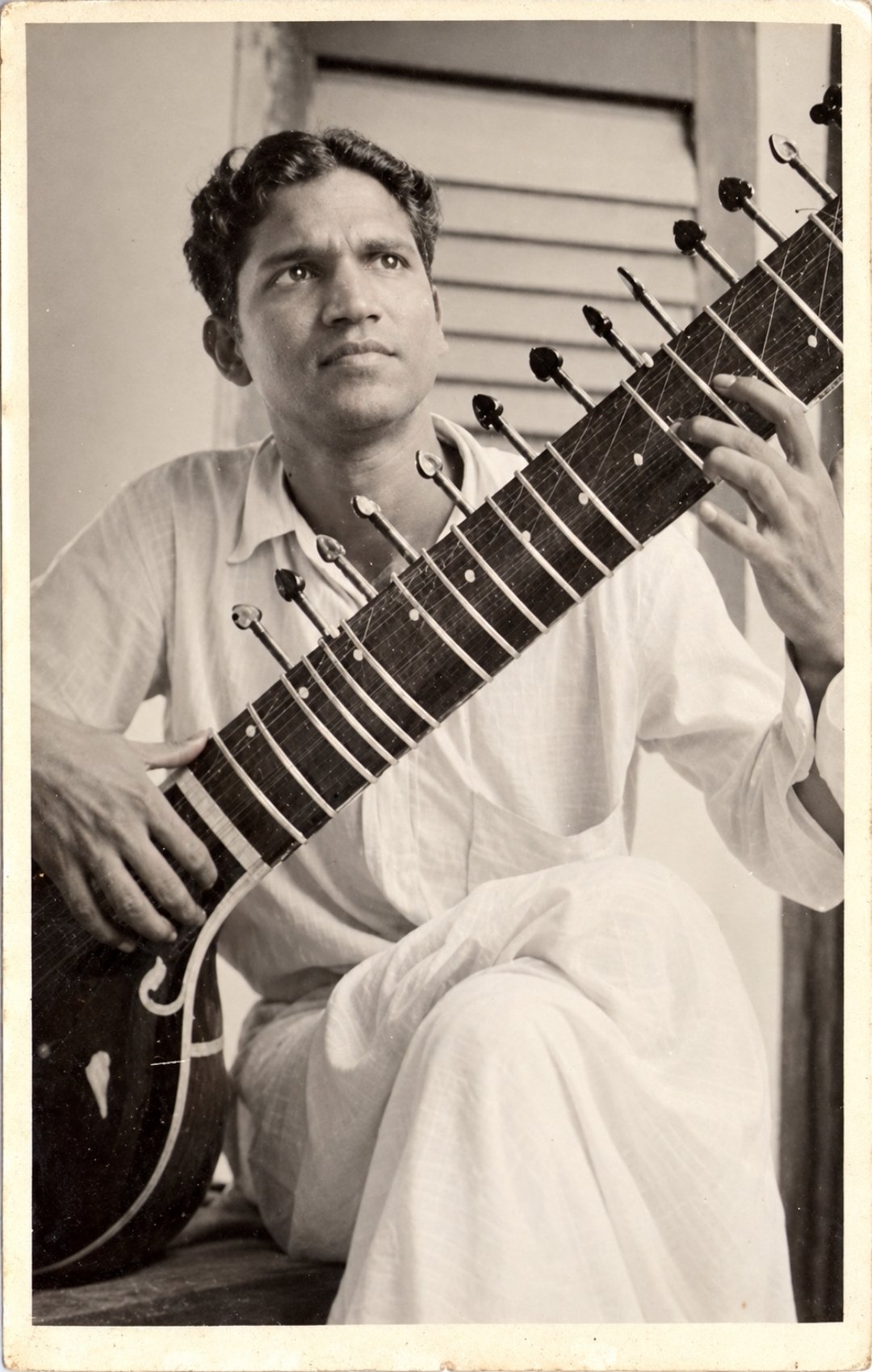 The young artist with his sitar, restored