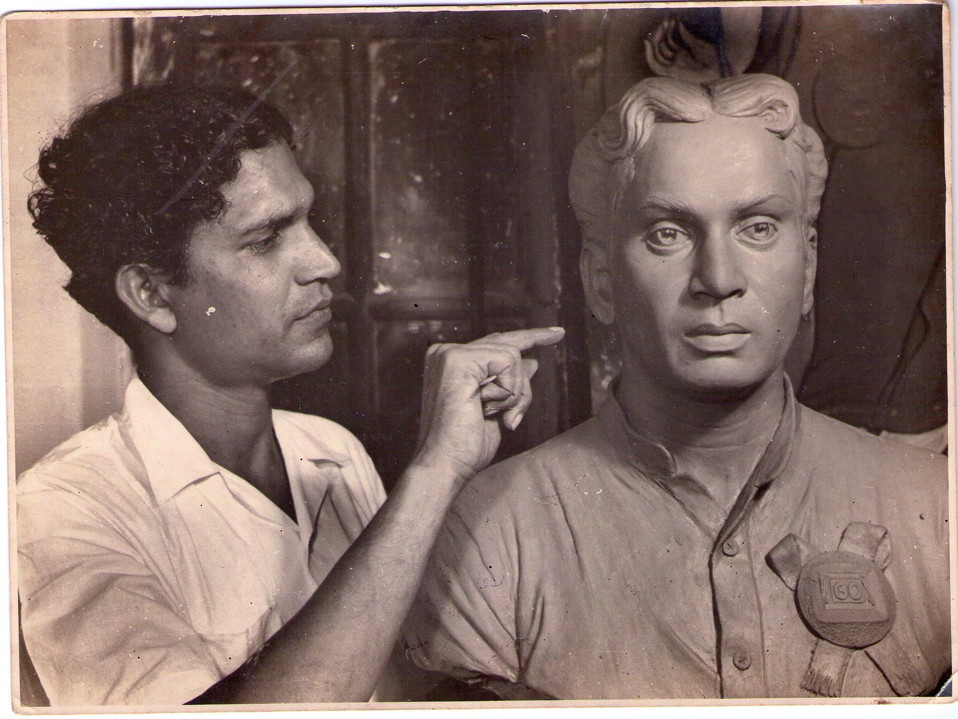 The artist sculpting the ANR bust