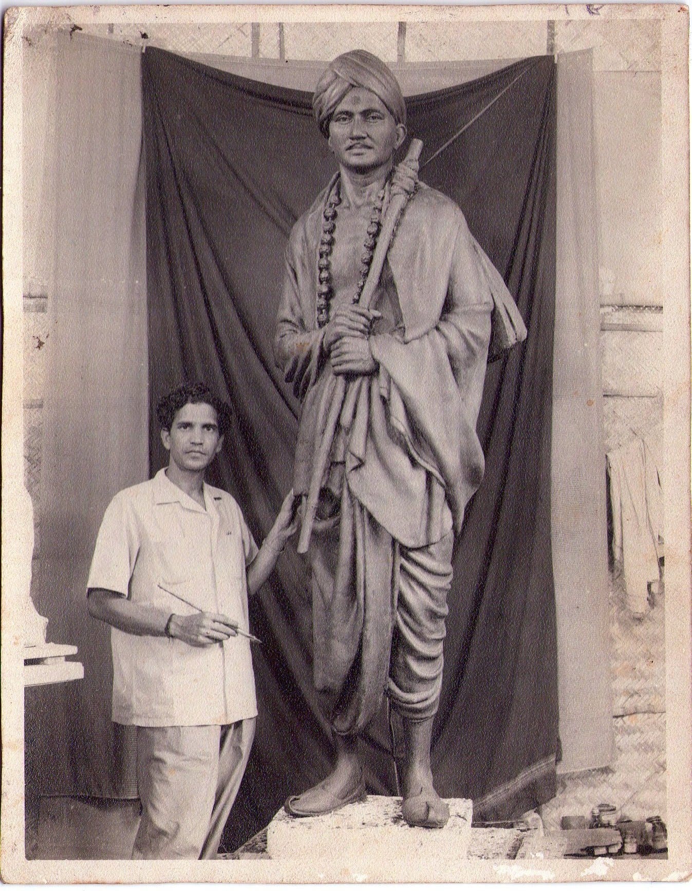 The artist beside the Duggirala Gopala Krishnayya statue